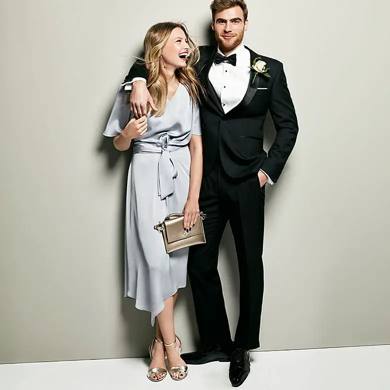A couple demonstrate how to dress for a black tie wedding