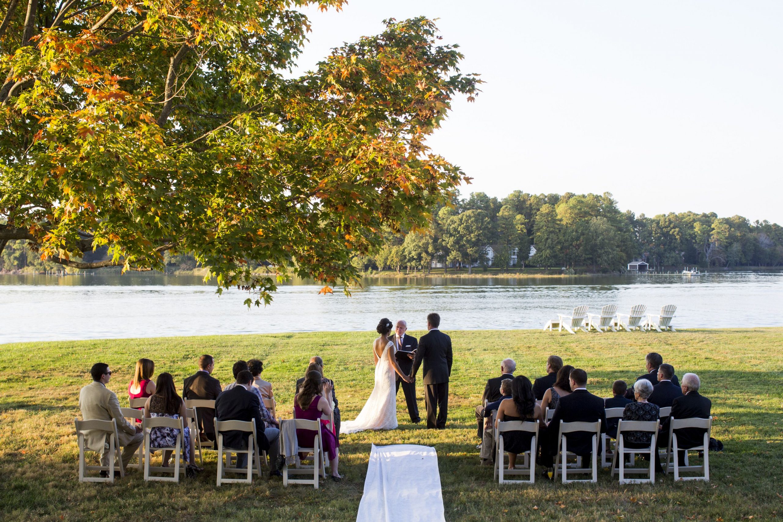 Backyard Wedding: Ceremony shots. A small wedding is ...