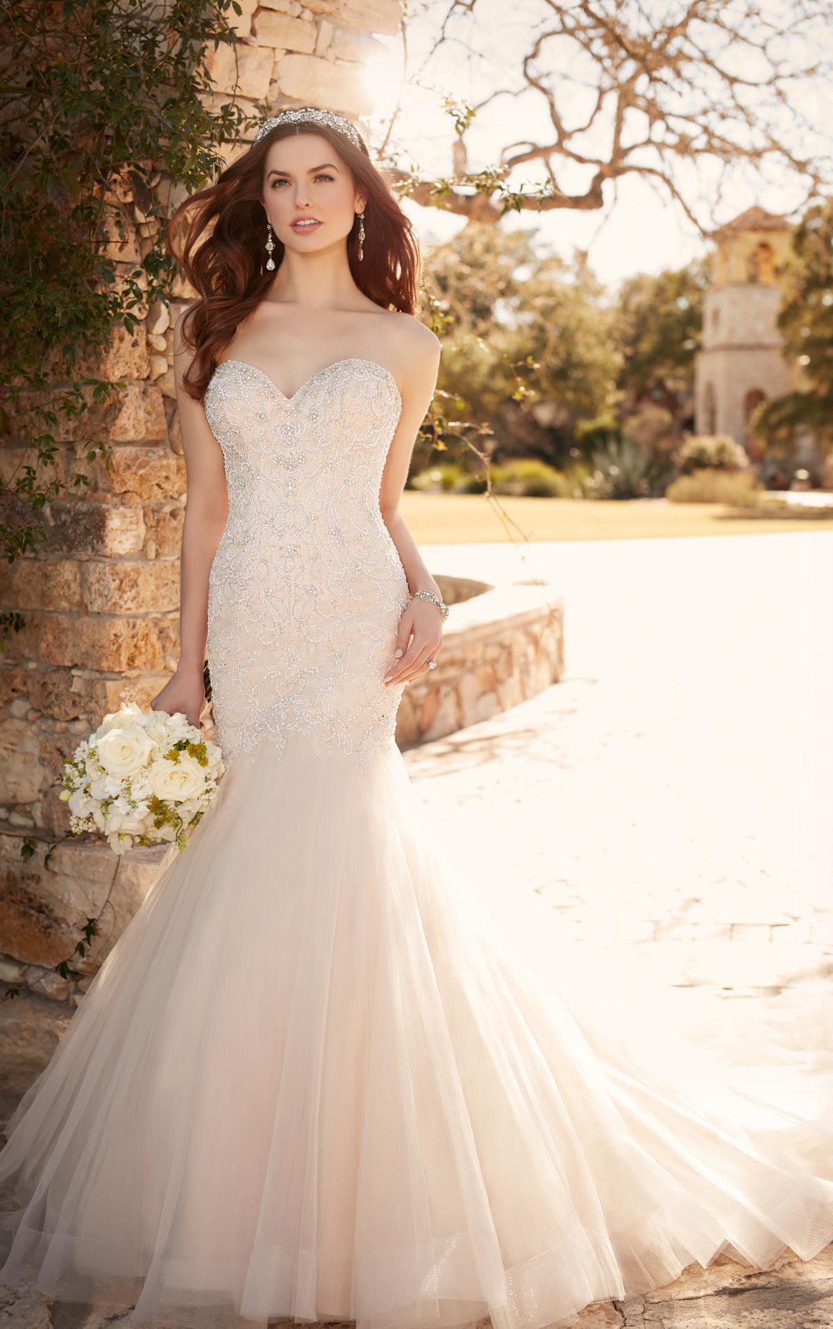 Fit and flare wedding dress with tulle skirt