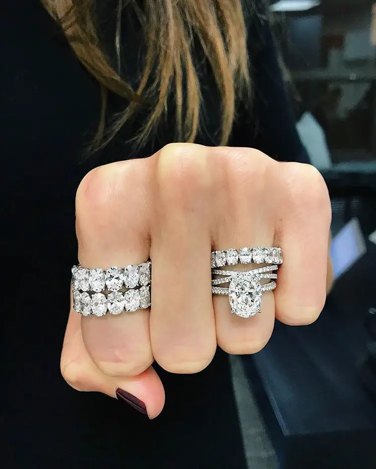 From left to right: Oval Diamond Eternity Band, Criss