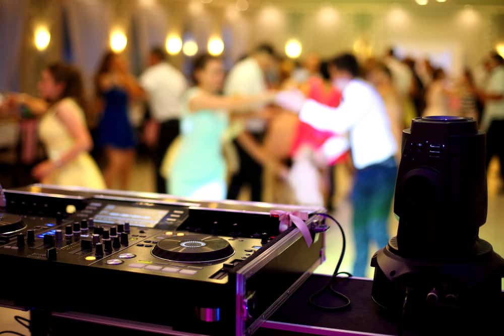 How Much Does a Wedding DJ Cost? (5 Tips to Save)