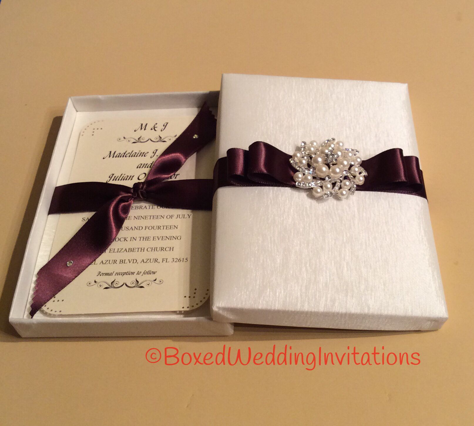 Luxury wedding invitation box adorned with white faux pearls and ...