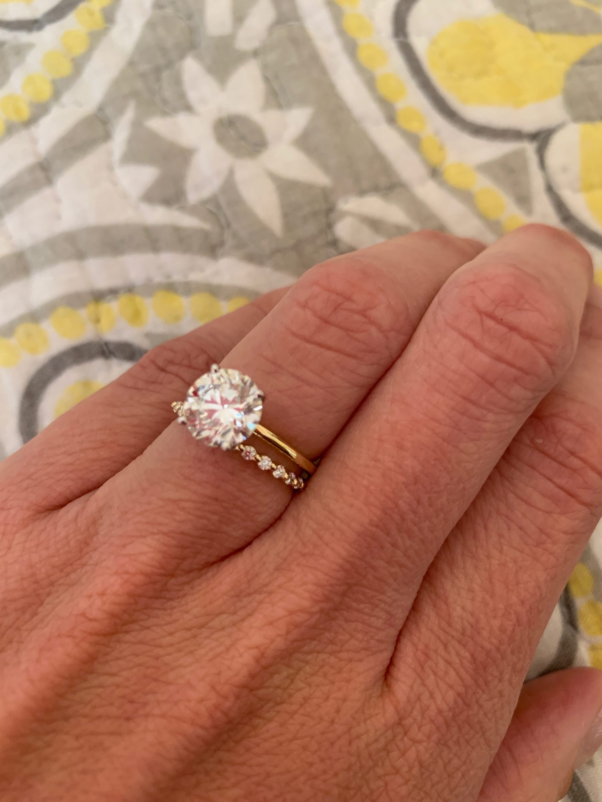 Post pics of your single prong wedding bands with your solitaires!