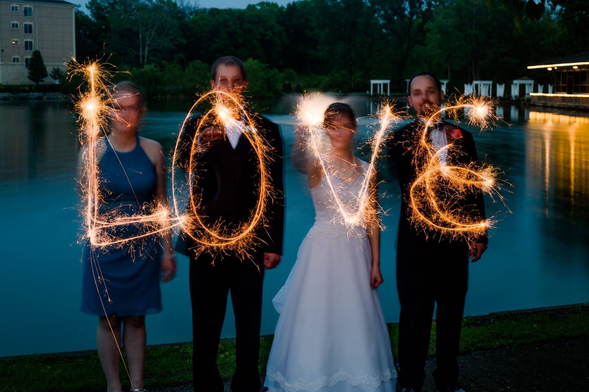 Sparklers help make great wedding photos!