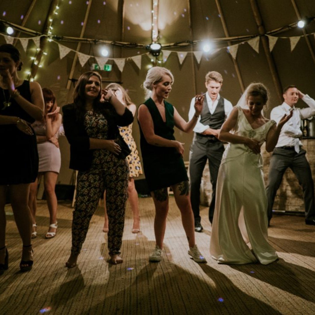 The Best Upbeat Wedding Entrance Songs To Kick Off Your Reception